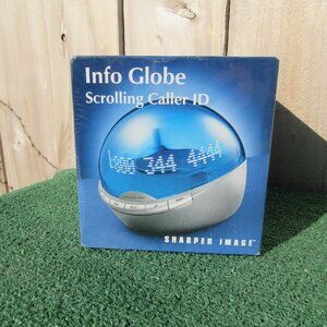Vintage Brand New Sharper Image Info Globe Scrolling Caller ID Clock WI701